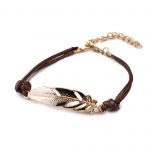 Pulsera pluma dorada de metal min.4